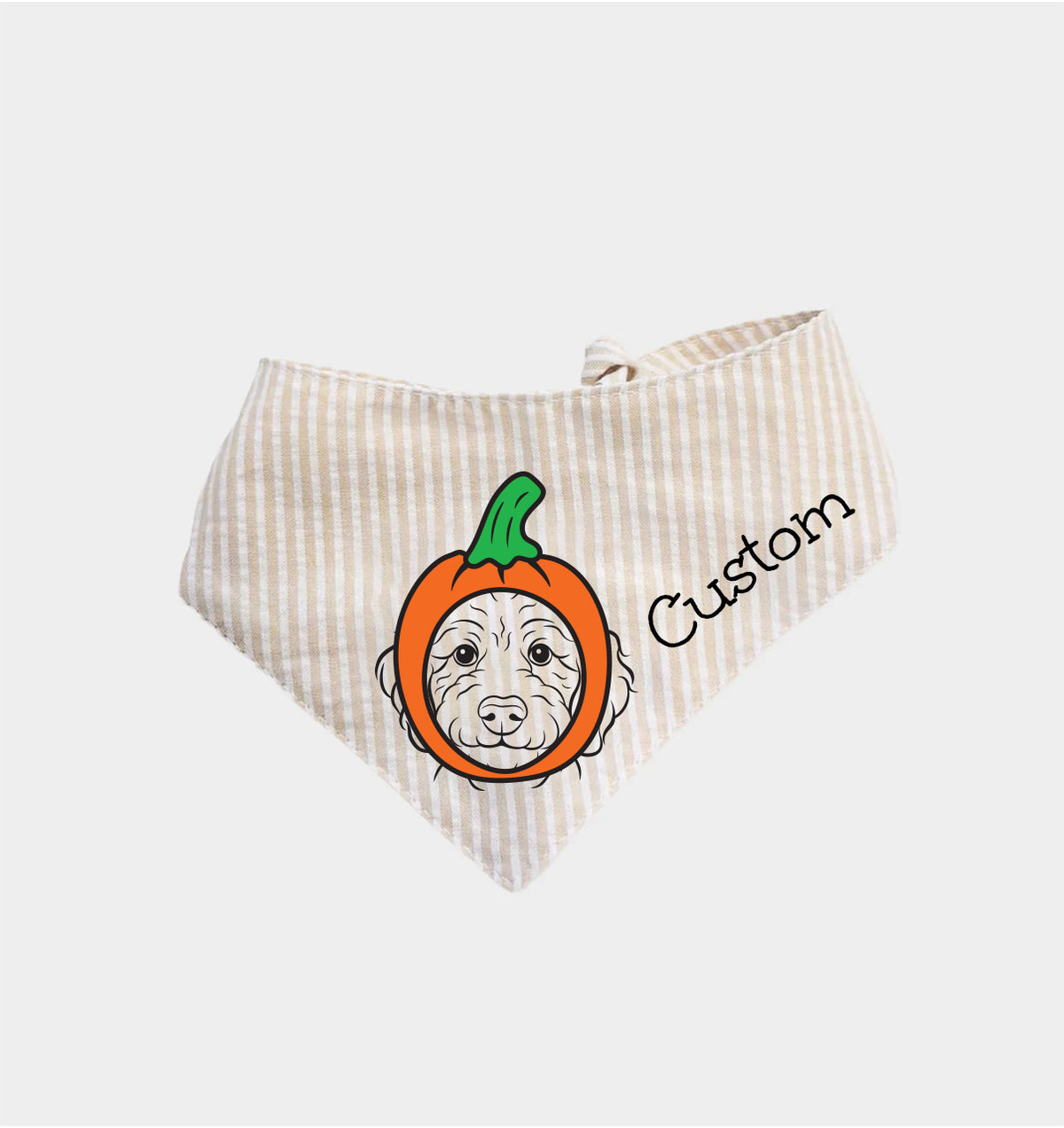 Beige striped dog bandana with pumpkin face graphic and custom text